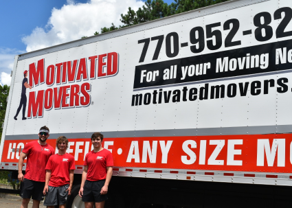 Motivated Movers Atlanta Truck parked in front of a customer's home, ready to serve all the time.